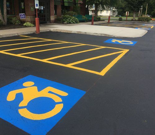 Universal Paving & Concrete installing ADA-compliant commercial paving in Rochester, NY, with ramps and accessible pathways for businesses and public spaces.