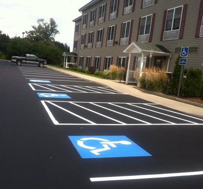 ADA-accessible commercial paving by Universal Paving & Concrete in Rochester, NY, ensuring safe, smooth entry points for individuals with disabilities.