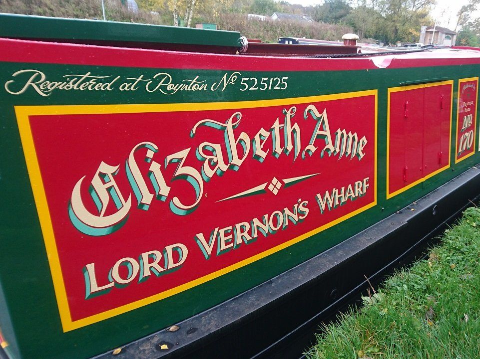Elizabeth Anne with Andy Russell sign writing