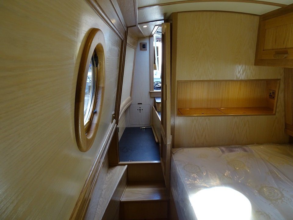 Narrowboat Fantastica bedroom to trad stern view