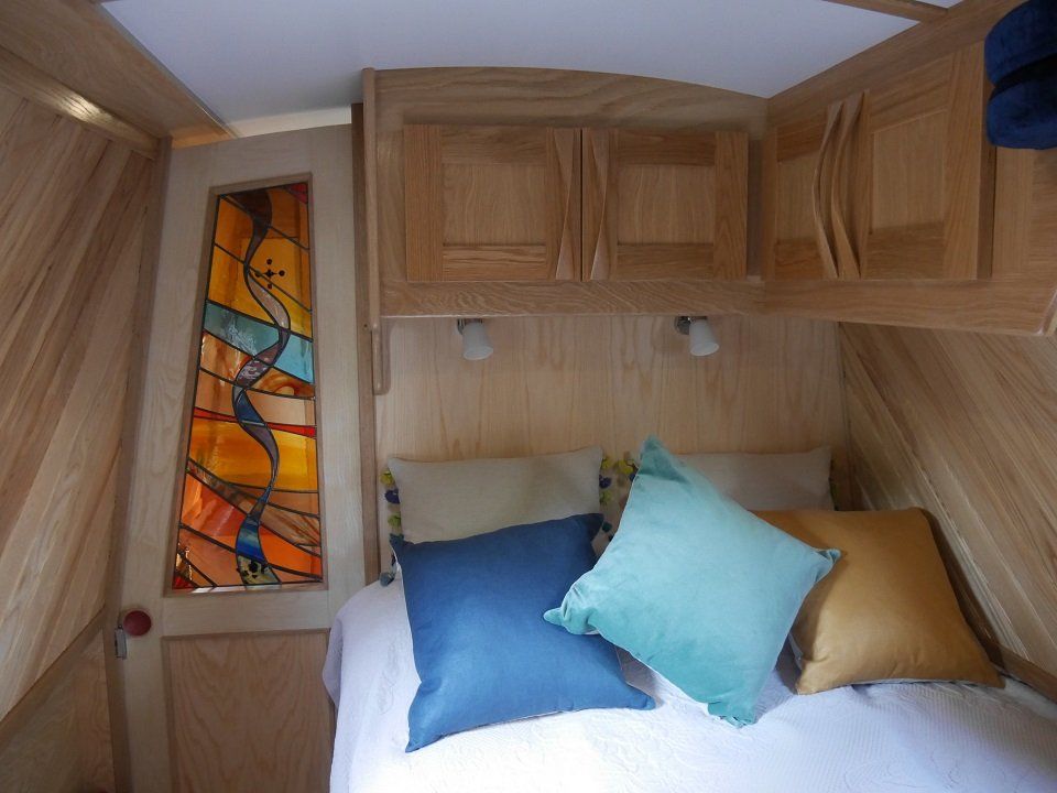 Jolly Good bedroom with designer glazed panel