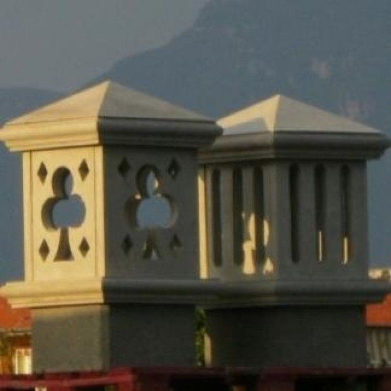 comignoli in cemento decorati