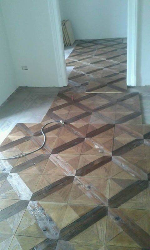posa di parquet a rombi