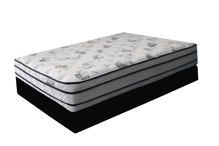 A white mattress with a black patterned fabric top sits on a solid black box spring base against a white background.