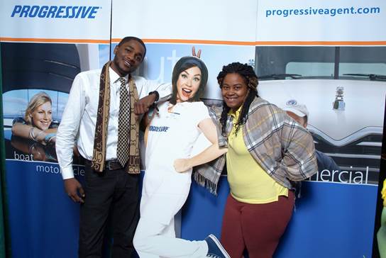 Local Homeowners Insurance Clients Posing with Progressive Mascot
