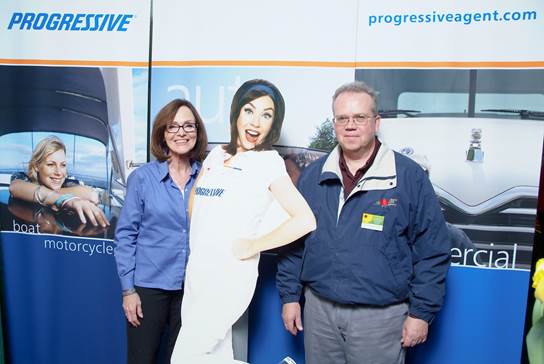 Local Motorcycle Insurance Agents Posing With Progressive Mascot
