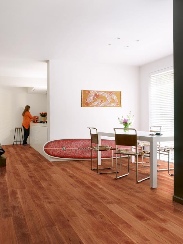 dining area with cherry wood laminate
