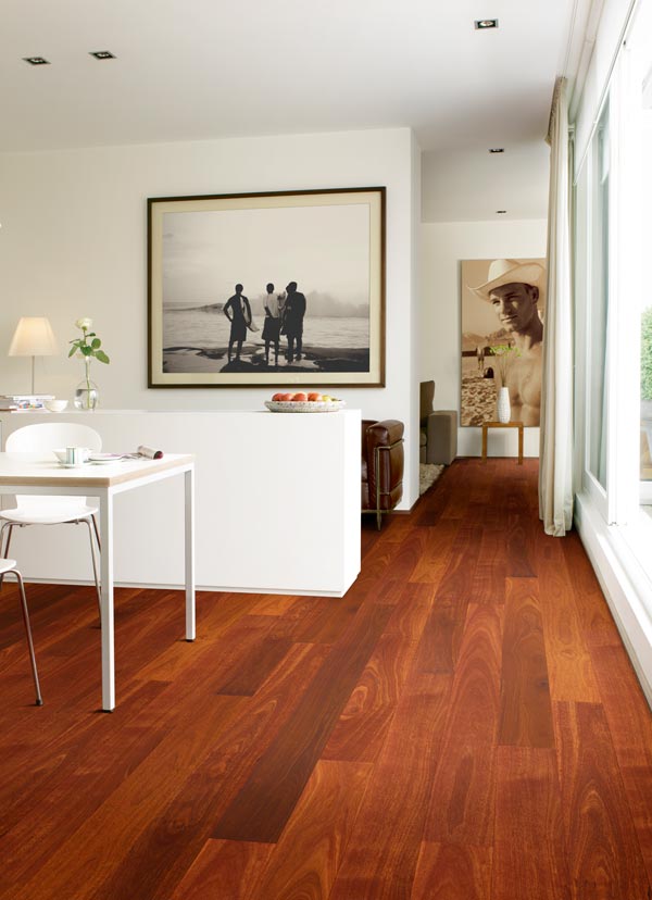 modern living area with dark cherry wood laminate