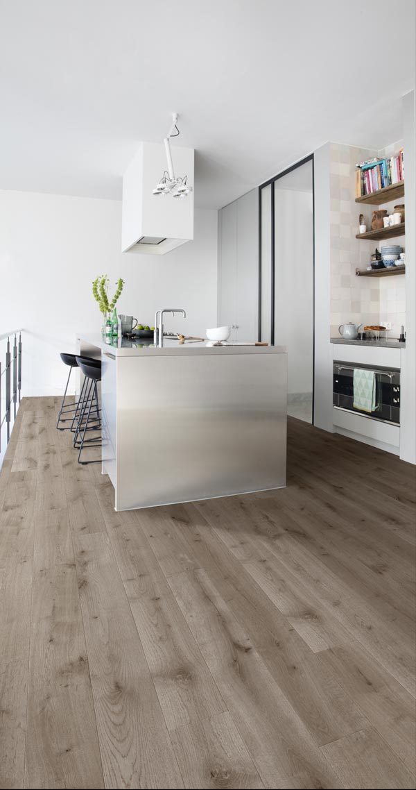 modern kitchen with grey toned laminate flooring