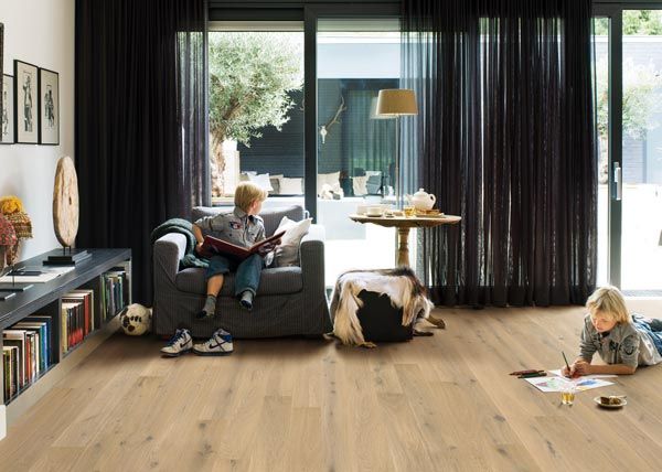 modern living space with kids on couch