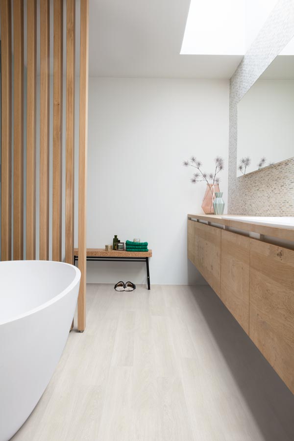 bathroom with white laminate flooring