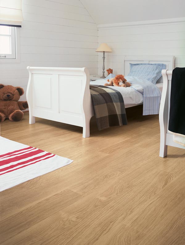bedroom with light wood laminate
