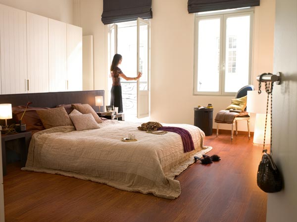 bedroom with laminate wood floors