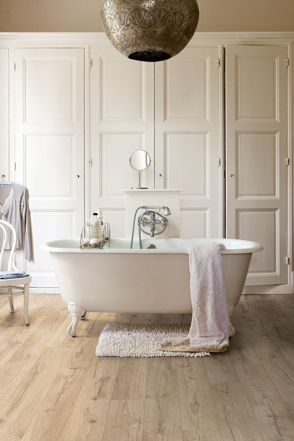 bathroom with laminate wood floors