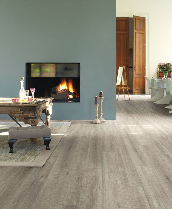 living room with light ash laminate wood floors