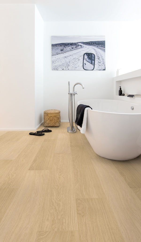 bathroom with laminate wood floors by Impressive Ultra