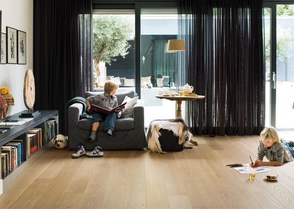 living room with kids on couch and new palazzo timber