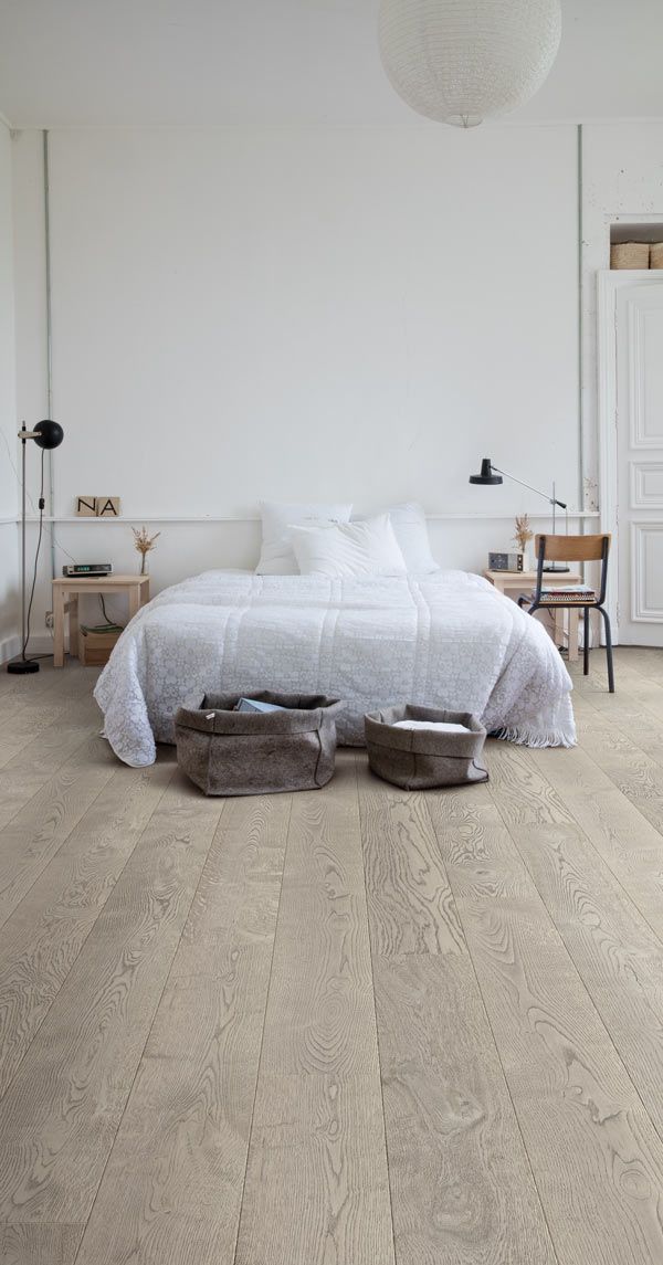 bedroom with light palazzo wood floor