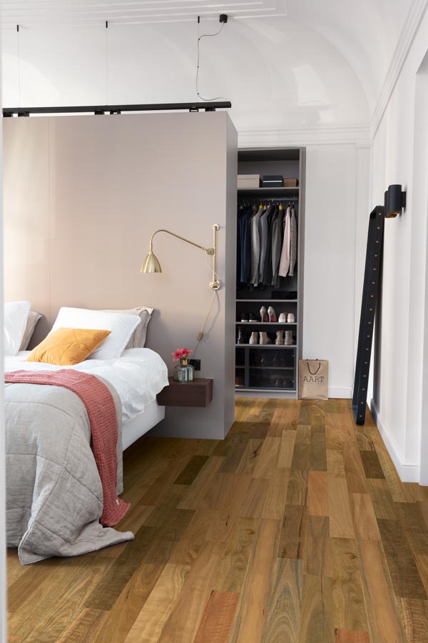 bedroom with medium dark timber floors