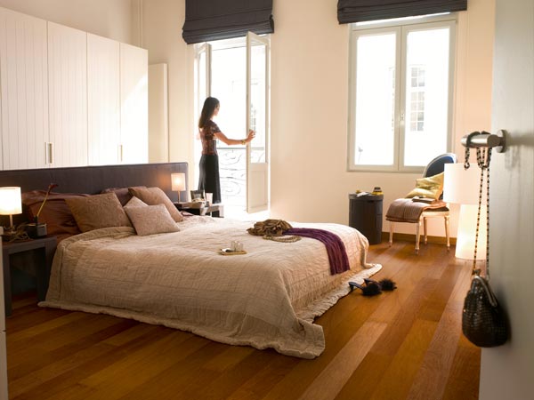 bedroom with cherry floors