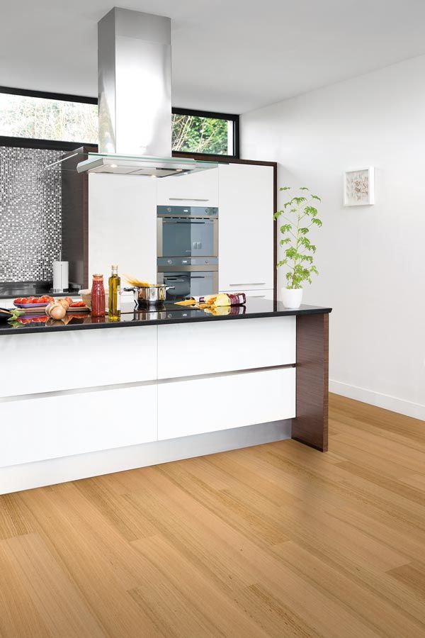 modern kitchen with light timber floors