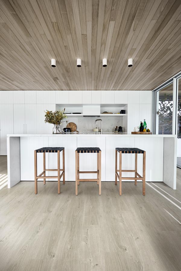 modern dining area with vinyl plank floor