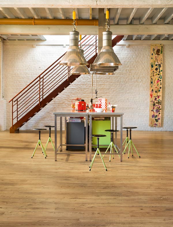 modern dining room with laminate wood floors