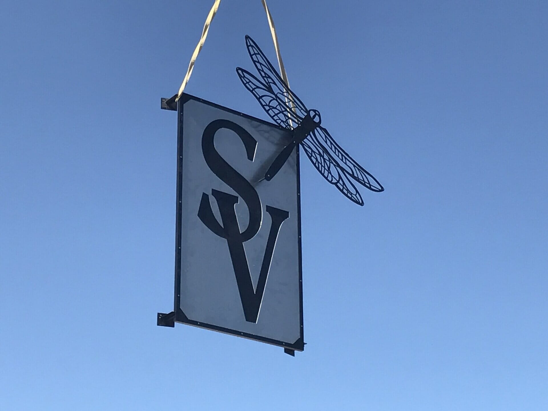 A sign hanging— Welders in Sandy, UT