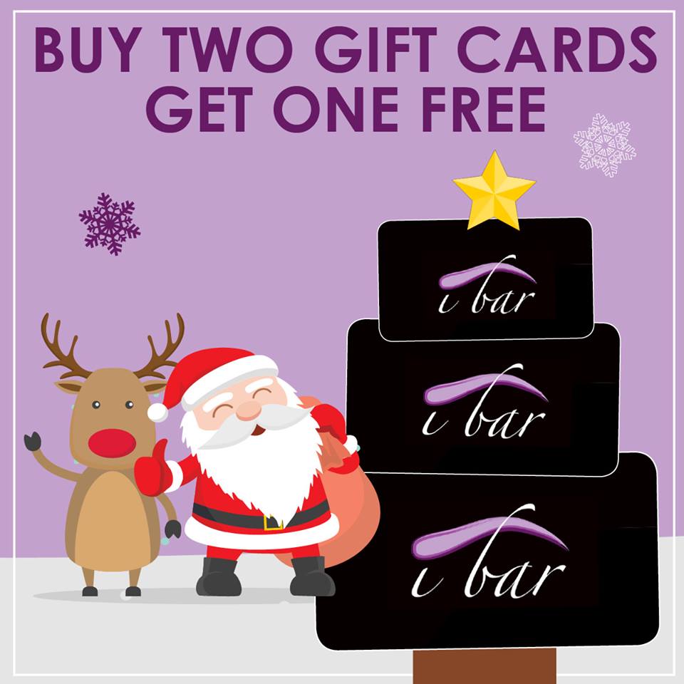 A poster that says buy two gift cards get one free