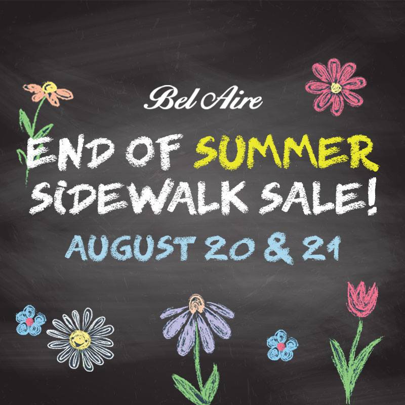 A chalkboard that says end of summer sidewalk sale august 20 & 21