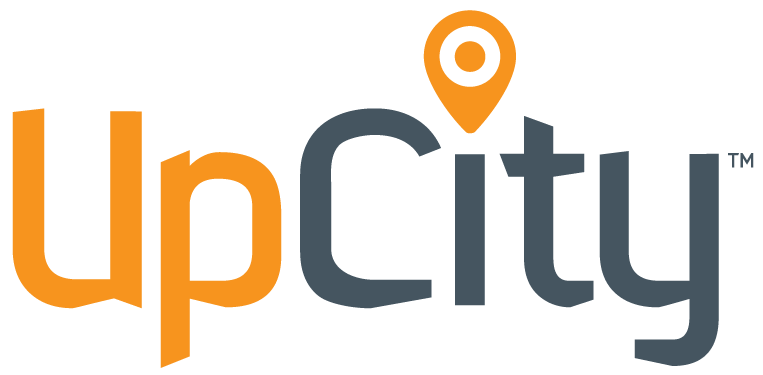 The logo for upcity is orange and black and has a pin on it.