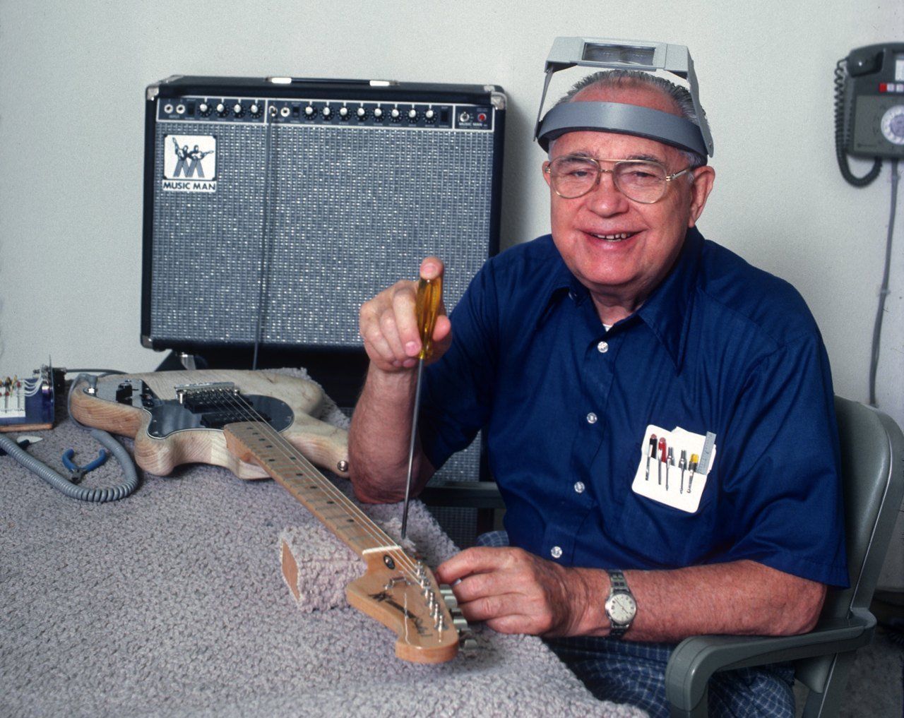 Leo Fender at work with his Music Man creations Leo Fender during the Music Man era working on a Sting Ray II guitar