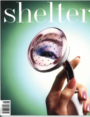 A woman holding a stethoscope on the cover of shelter magazine