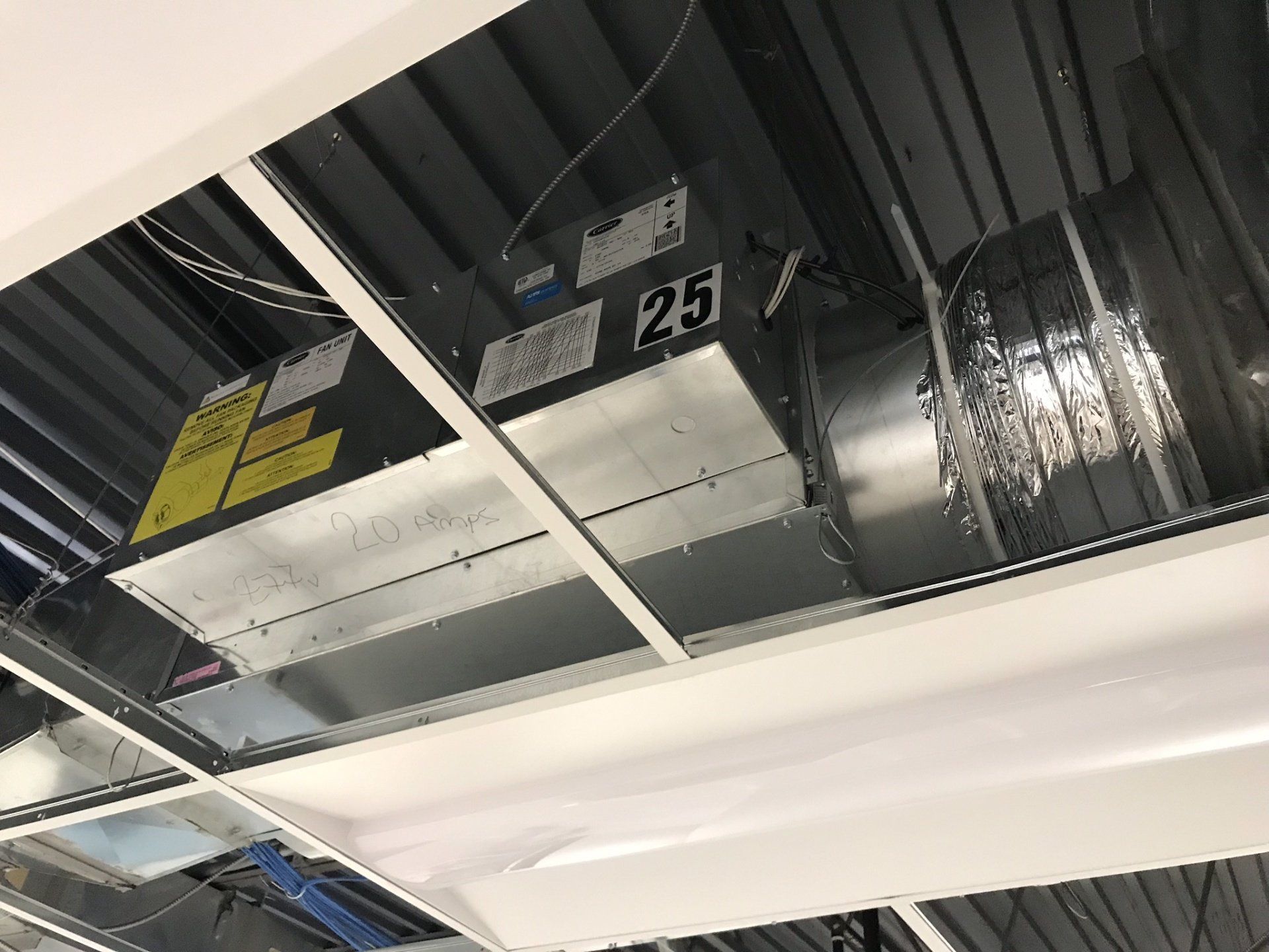 A close up of a ceiling with a number 25 on it.