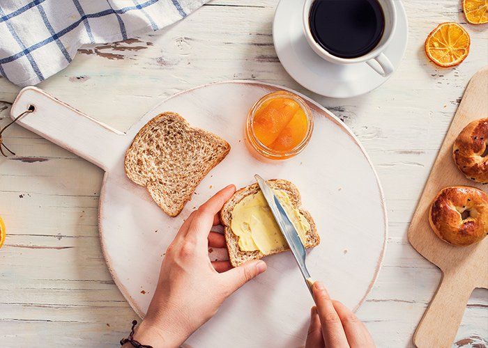 Michigan — Spreading Butter On Sliced Bread In Redford, MI Michigan — Spreading Butter On Sliced Bread In Redford, MI