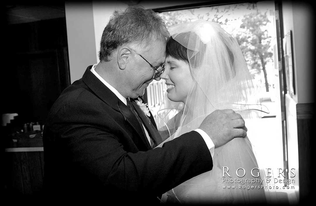 A black and white photo of a bride and her father wedding photographed by Rogers Photography in Connecticut. 