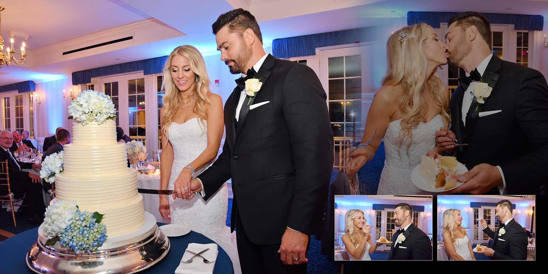 Bride and groom cut a tiered wedding cake at a reception with guests watching nearby.