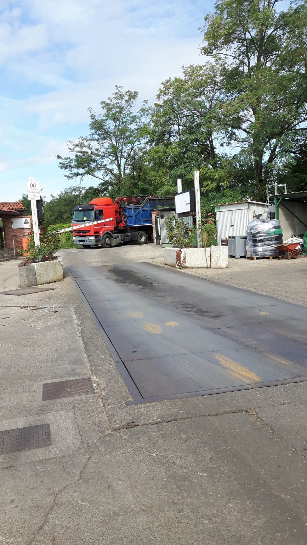 truck with roll-off container
