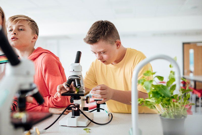 teen with down syndrome in lab