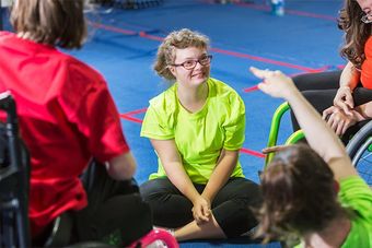 down syndrome women on gymnast mat