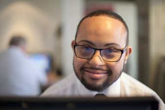 man with down syndrome smiling