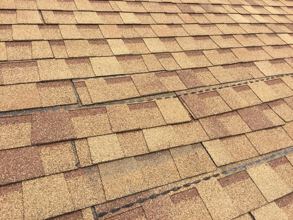new tan shingle roof.
