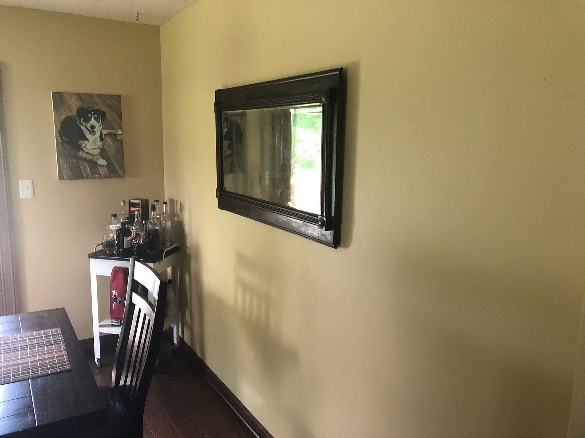 dining room with mirror