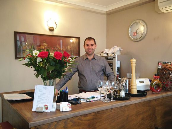 The owner of san Lorenzo welcoming guests in Sheffield