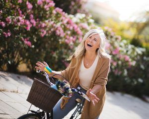 Woman Biking — Pinole, CA — Dalia E. Perez-Salinas, D.D.S. Woman Biking — Pinole, CA — Dalia E. Perez-Salinas, D.D.S.
