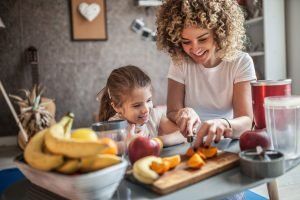 Mother and Daughter in the Kitchen — Pinole, CA — Dalia E. Perez-Salinas, D.D.S. Mother and Daughter in the Kitchen — Pinole, CA — Dalia E. Perez-Salinas, D.D.S.