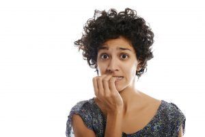 Woman Biting Fingernails — Pinole, CA — Dalia E. Perez-Salinas, D.D.S.