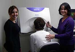 Staff performing eye exams with client at Brunswick Eye Care Associates in Maine Staff performing eye exams with client at Brunswick Eye Care Associates in Maine