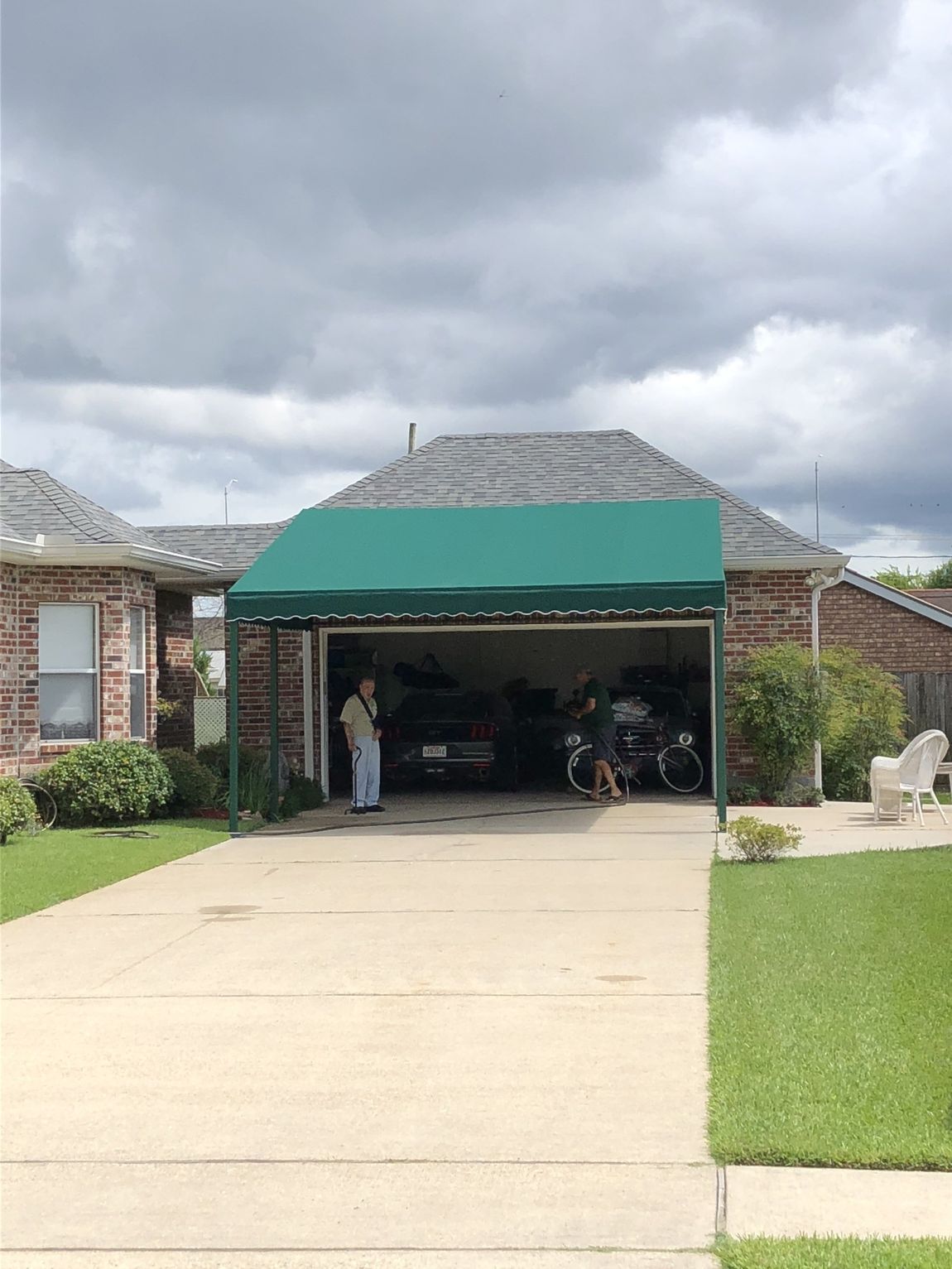 Custom Stationery — Green Canopy Installed On A Garage in Chalmette, LA