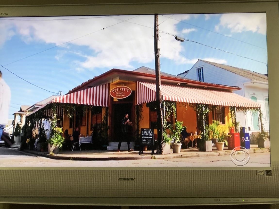 Awnings Installed — A Shop With Red Striped Awnings Installed in Chalmette, LA